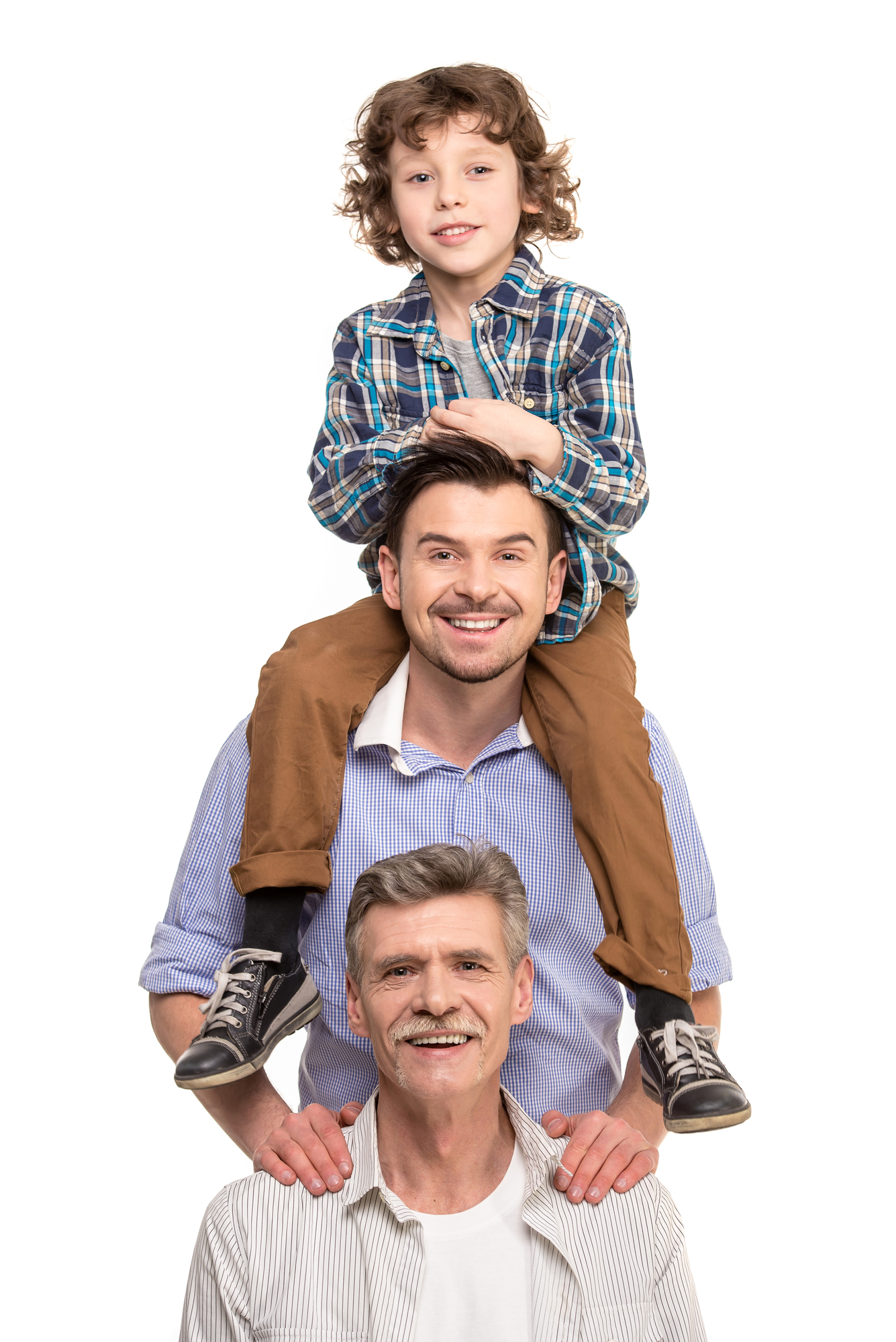 Generation portrait. Grandfather, father and son, isolated a white background.